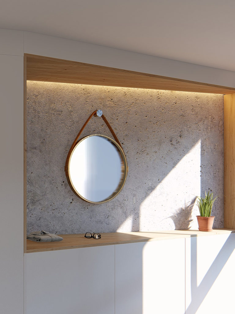 Détail niche bois rétroéclairé d'un dressing sur mesure avec mur béton brut et miroir design